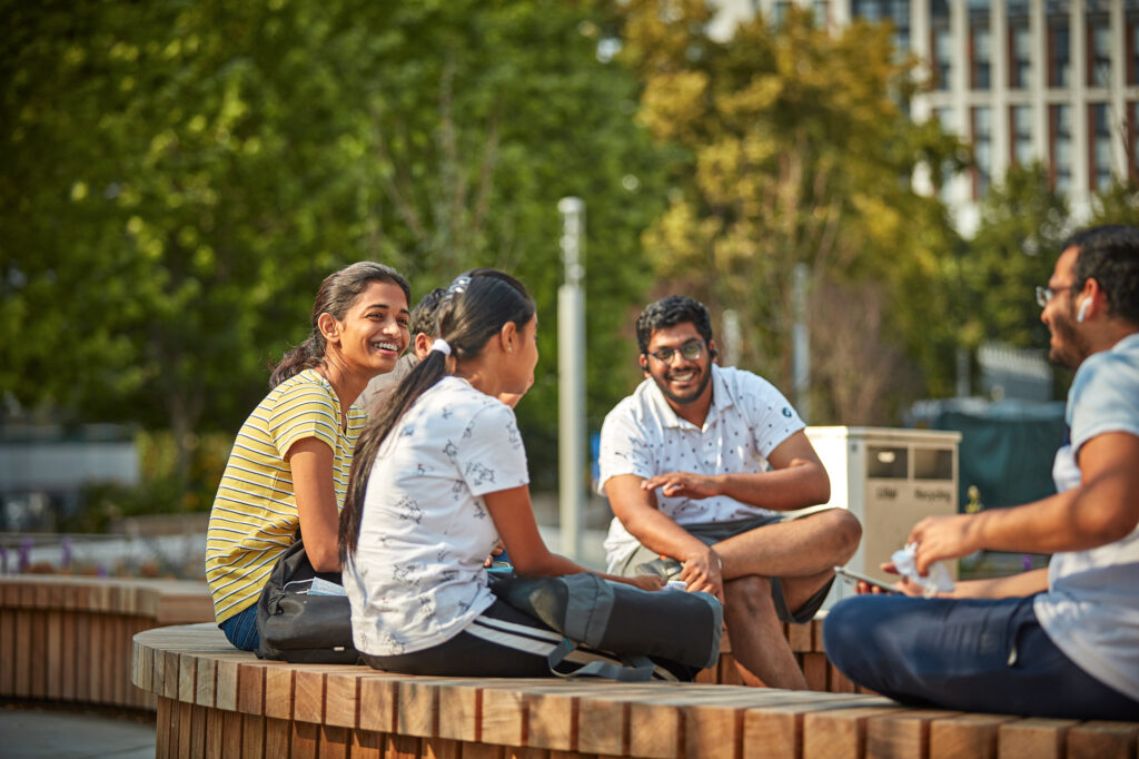 Students sitting talking near ONE Friargate offices